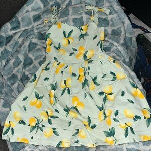Francesca’s shoulder bow Lemon dress sz 7